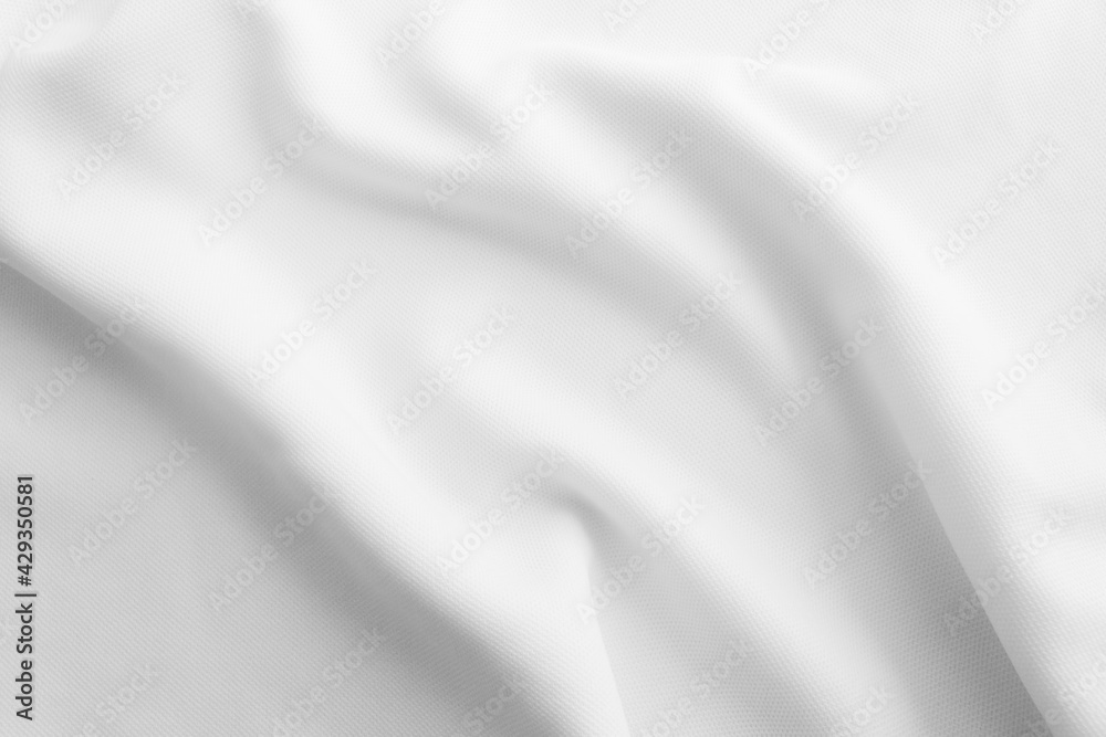 Folded white cloth for background. Rippled fabric texture