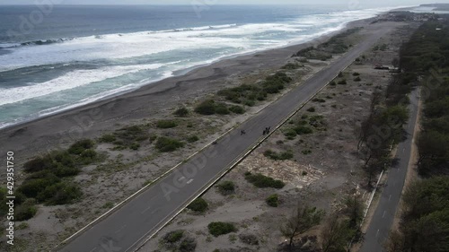 Aerial view of asphalt road for aero sport near beach in Landasan Pacu Depok, Bantul, Yogyakarta photo