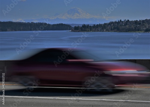fast car driving on a highway with mountain