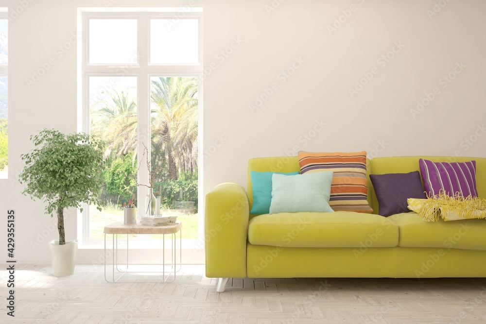 Fototapeta premium White living room with sofa and summer landscape in window. Scandinavian interior design. 3D illustration