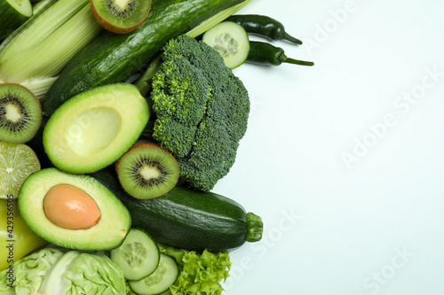 Fresh green vegetables on white background  space for text