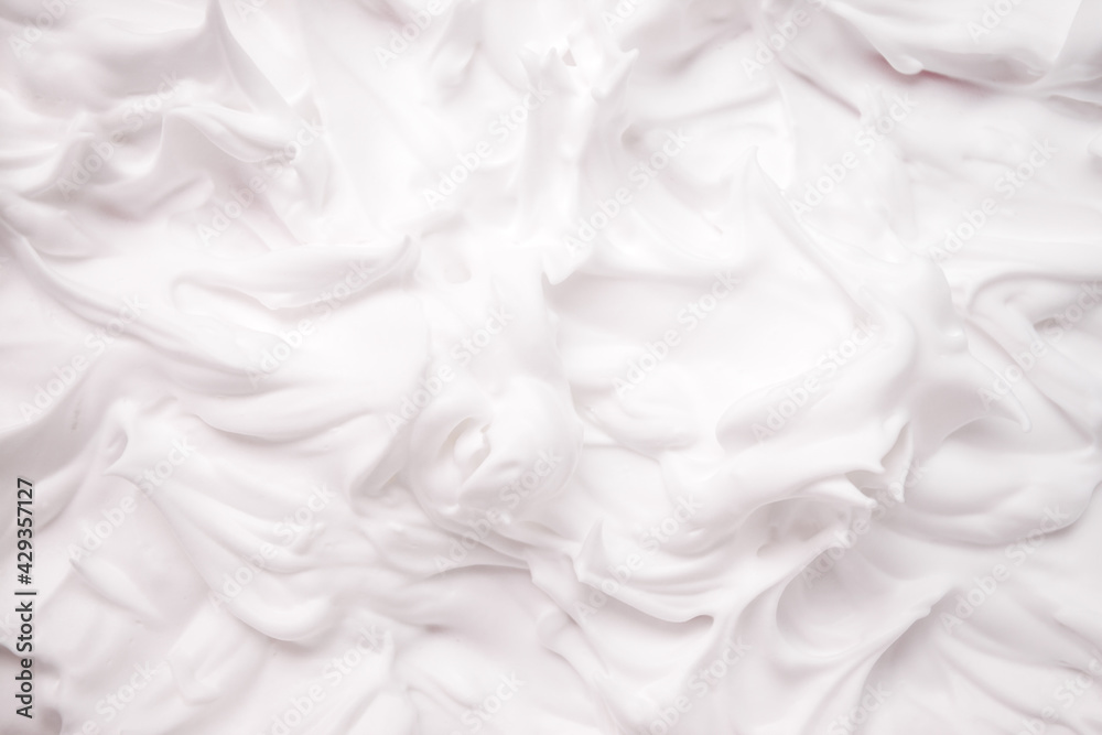 White cosmetic foam texture background. Cosmetic mousse, cleanser, shaving foam, shampoo. Foamy skin care product, skincare, male hygiene concept, copy space White cosmetic foam texture background. Cosmetic mousse, cleanser, shaving foam, shampoo. Foamy skin care product, skincare, male hygiene concept, copy space