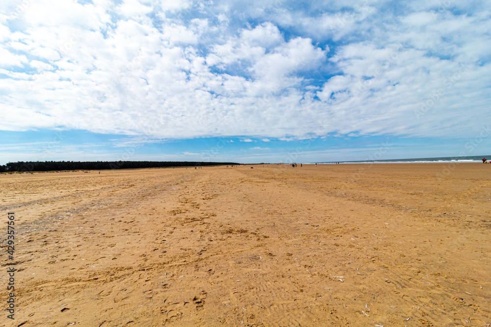 Walking on the beach in england, Holkland Beach North Sea Walking on the beach in england, Holkland Beach North Sea