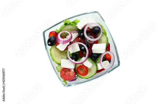 Bowl of greek salad isolated on white background