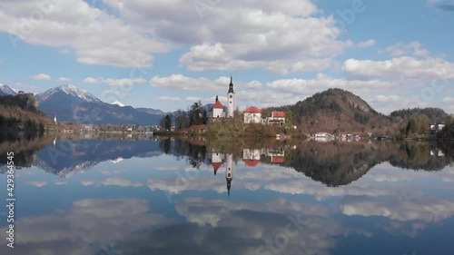 Wallpaper Mural Closing up to Bled island in the middle of the lake with drone. Most famous Slovenian lake and island Bled. Aerial view of Island in Bled Lake. Torontodigital.ca