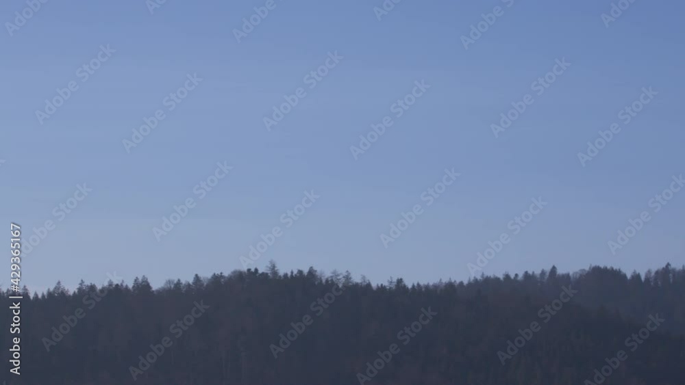 delivery drone carrying parcel flying across the blue sky delivery drone carrying parcel flying across the blue sky