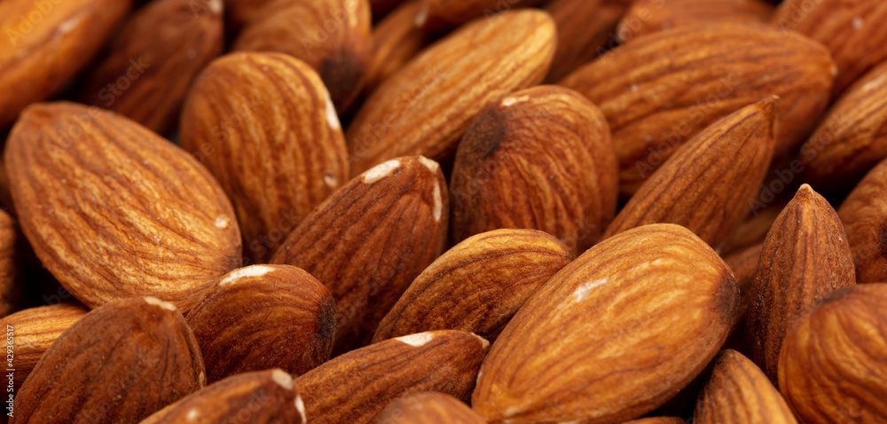 Fototapeta premium Close up of almond nuts as background.
