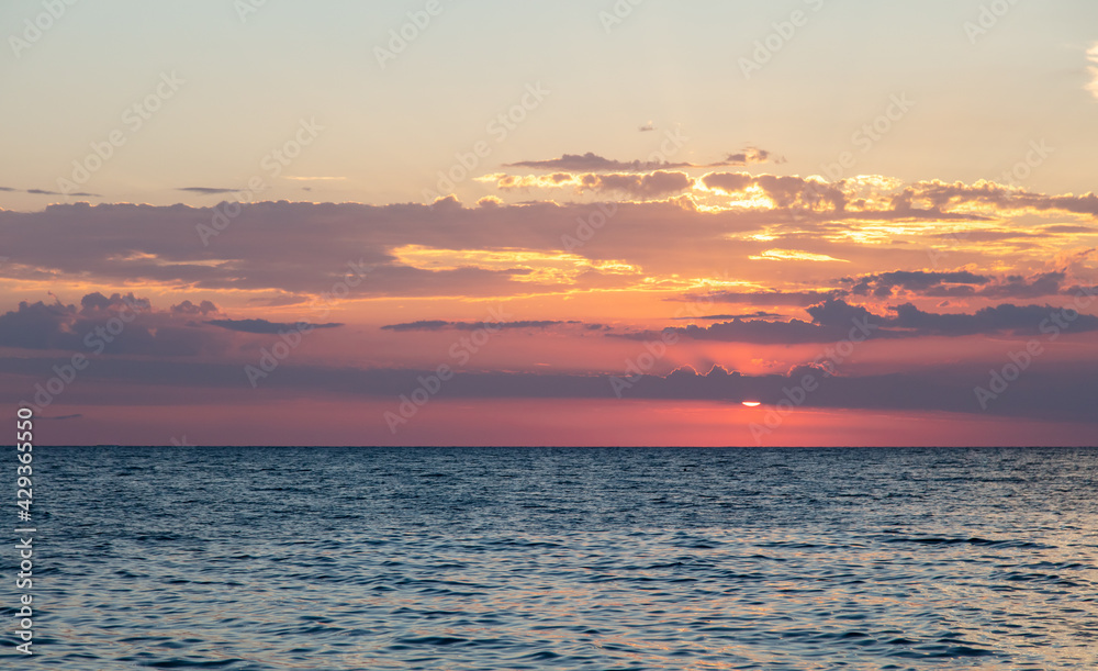 Horizon on the sea at sunset.