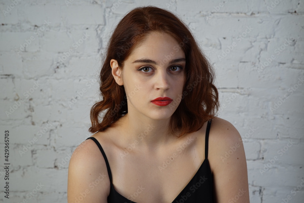 Photo of a young beautiful girl in a photo studio Photo of a young beautiful girl in a photo studio