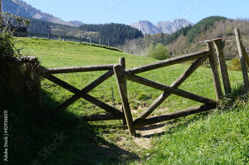 a wooden fence in the field in the faults of the mote Urkiola, Basque Country
