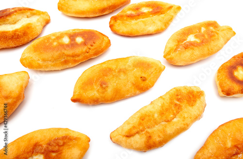 Fried patties in oil isolated on a white background.