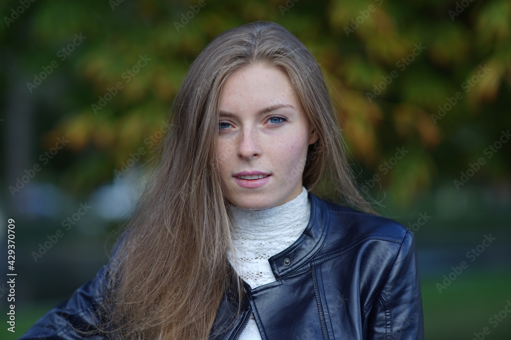 Portrait of a young beautiful girl in the park Portrait of a young beautiful girl in the park