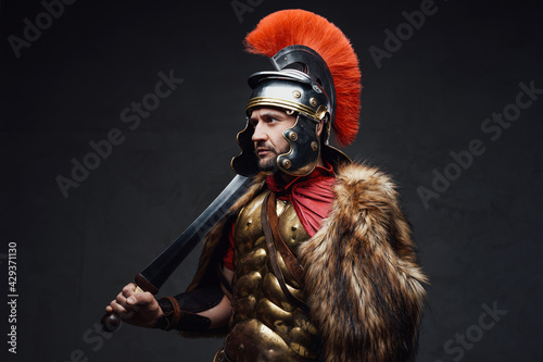 Studio shot of roman soldier wearing fur photo