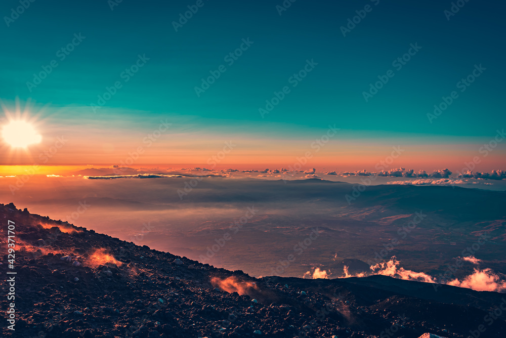 Dreamy sunset above the sky. View from the top of Mt Etna 