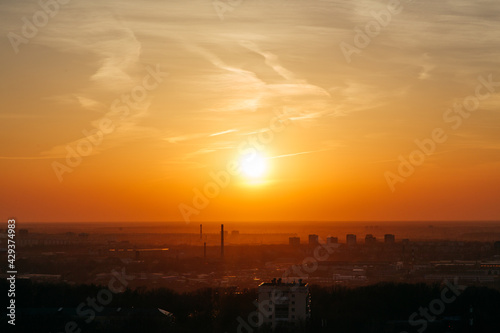 Beautiful golden sunset over the city  panoramic view