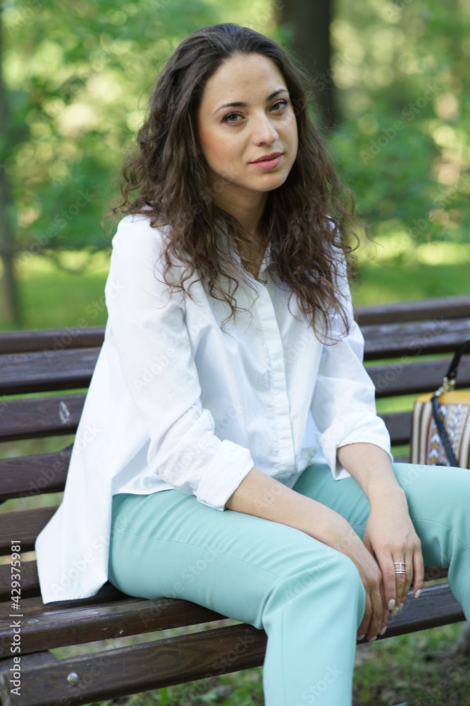 Portrait of a young beautiful girl in the park Portrait of a young beautiful girl in the park