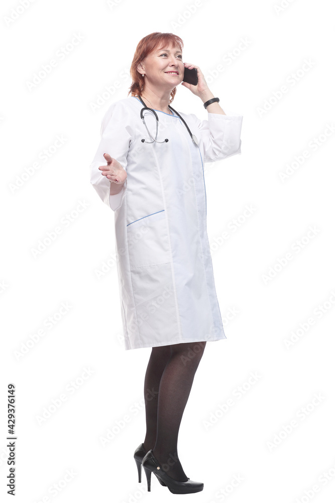 in full growth. medical woman with a smartphone.
