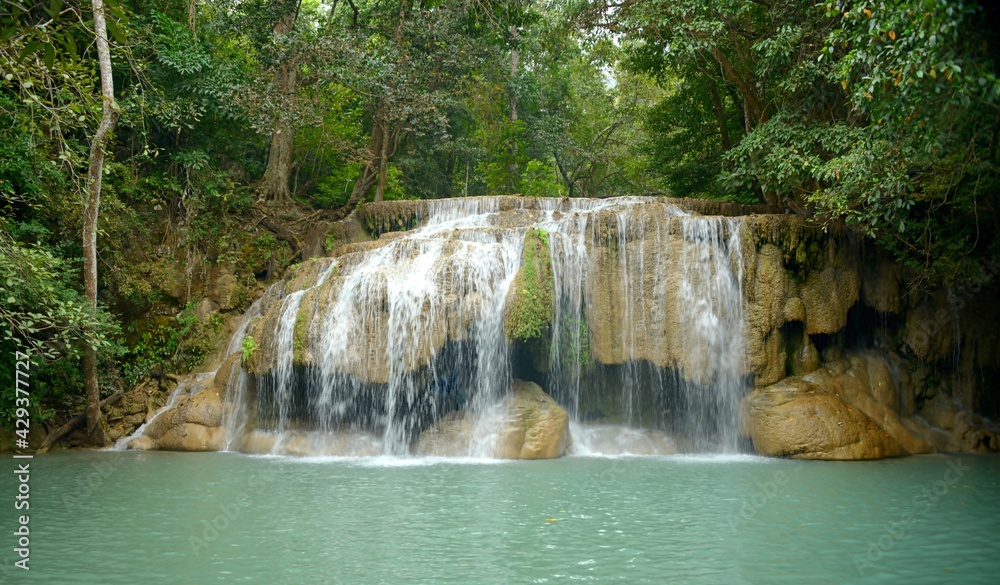 THAILAND-The falls are striking clear emerald green waters located in Erawan National Park. Formed by 7 levels with natural pools