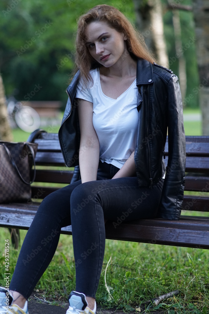 Portrait of a young beautiful girl in the park Portrait of a young beautiful girl in the park