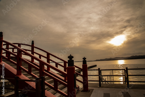 Japanese-style bridge on Lake Hamana lit by the setting sun in Shizuoka_02 photo