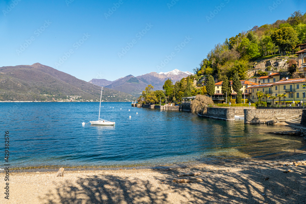 The Colmegna coast with its beach and its villas