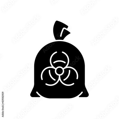 Infectious waste bag black glyph icon. Disposable biohazard trash. Dangerous chemical hospital waste. Quarantine safety. Disposable PPE. Silhouette symbol on white space. Vector isolated illustration