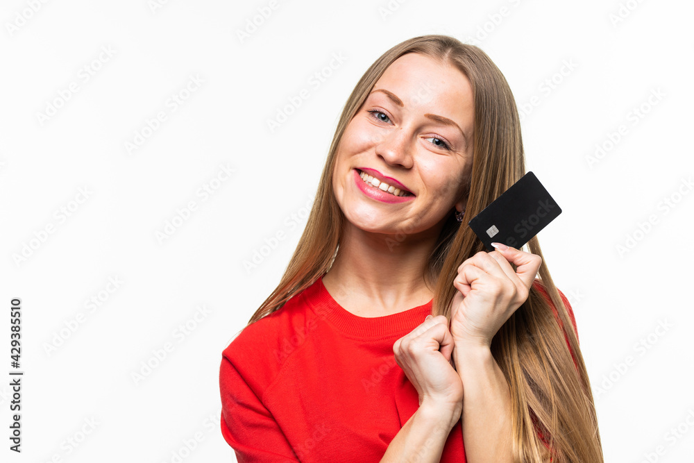 Happy young woman hold credit card isolated on white background Happy young woman hold credit card isolated on white background