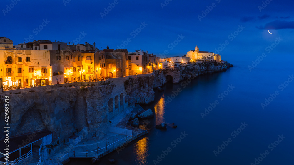 Scenic view of Vieste with the church of San Francesco by night, Gargano, Puglia, Italy