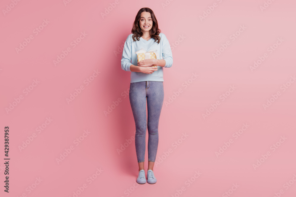 Portrait of a cute adorable sweet young woman embrac cuddle present giftbox Portrait of a cute adorable sweet young woman embrac cuddle present giftbox