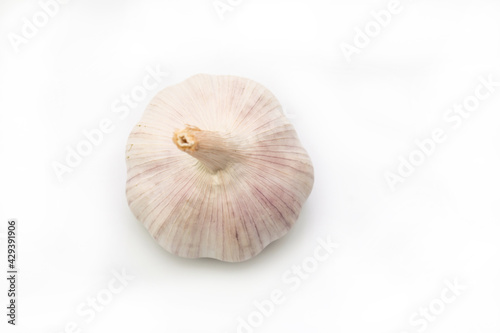Raw garlic isolated on white background.