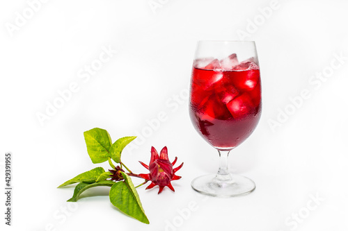 Принти на полотні Fresh Roselle flower ( Jamaica sorrel, Rozelle or hibiscus sabdariffa ) and glass of sorrel juice ice tea isolated on white background
