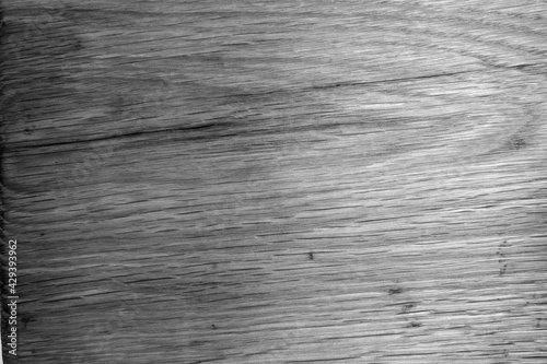 Old oak board texture as background with blur effect in black and white.