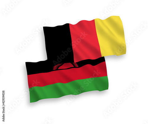 National vector fabric wave flags of Malawi and Belgium isolated on white background. 1 to 2 proportion.