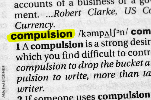 Highlighted word compulsion concept and meaning.