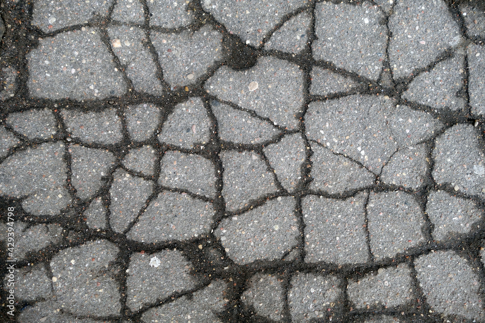 Obraz premium Broken asphalt texture.
