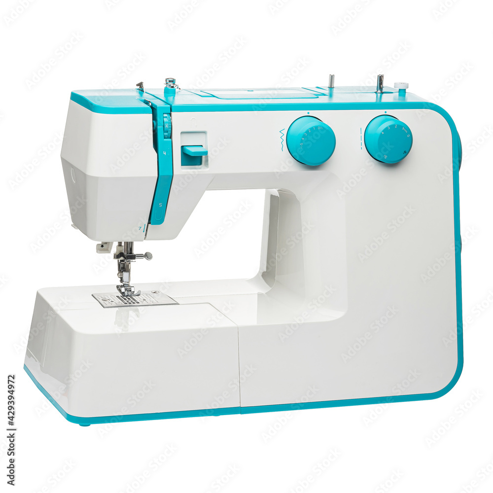 Sewing machine for sewing clothes from fabric on a white isolated background. Front view