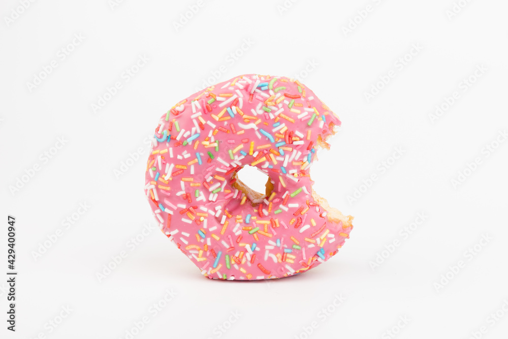 Fresh made Donuts isolated on white background. Doughnuts are traditional sweet pastries. Copy space for text. Fresh made Donuts isolated on white background. Doughnuts are traditional sweet pastries. Copy space for text.