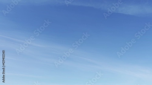 Blue sky and soft white clouds timelapse