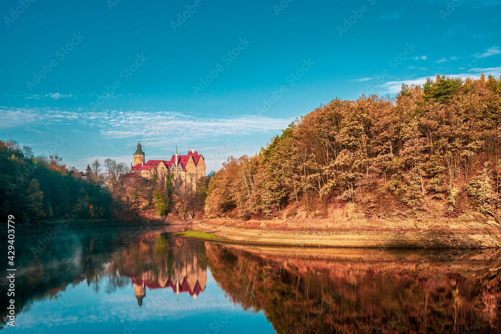 View of Czocha Castle on Lake Leśnia in Poland.