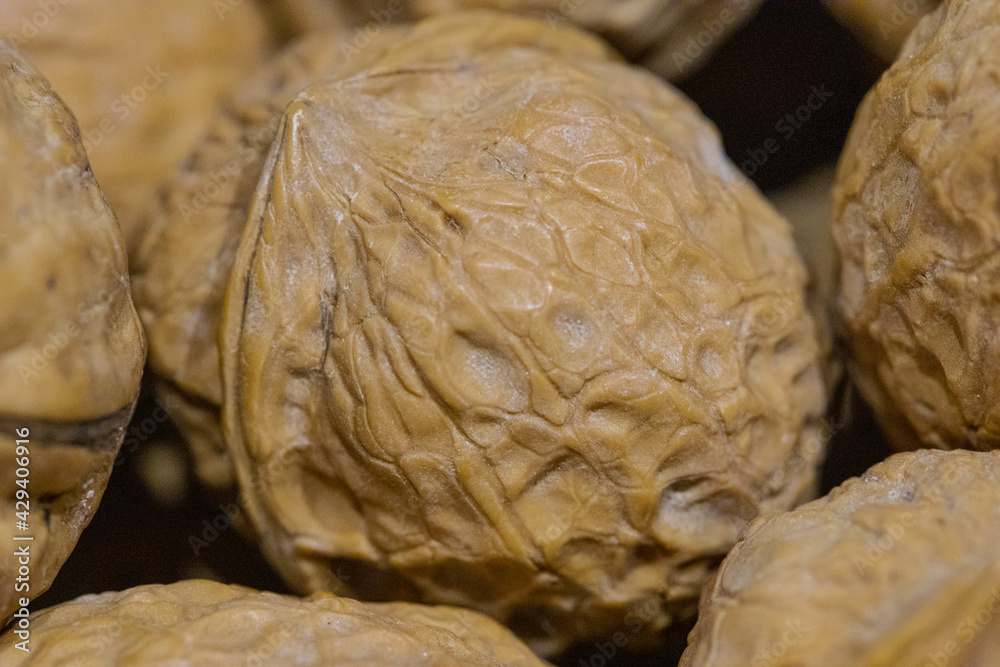 Fototapeta premium close up of a hard shelled brown wallnuts