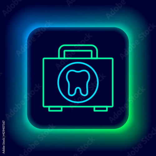 Tableau sur toile Glowing neon line First aid kit icon isolated on black background