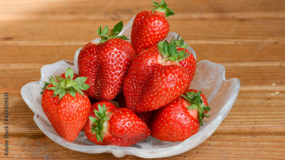 Cup full of red strawberries Cup full of red strawberries