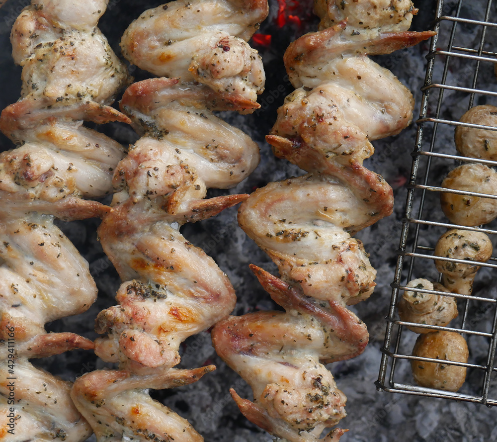 Barbecue with chicken wings. Close. Summer day Barbecue with chicken wings. Close. Summer day