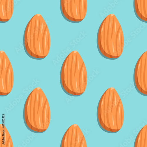 Seamless pattern with almonds. Cute print with nuts on a blue background. Food and snacks icon