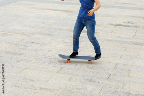 Skateboarder skateboarding outdoors in the morning