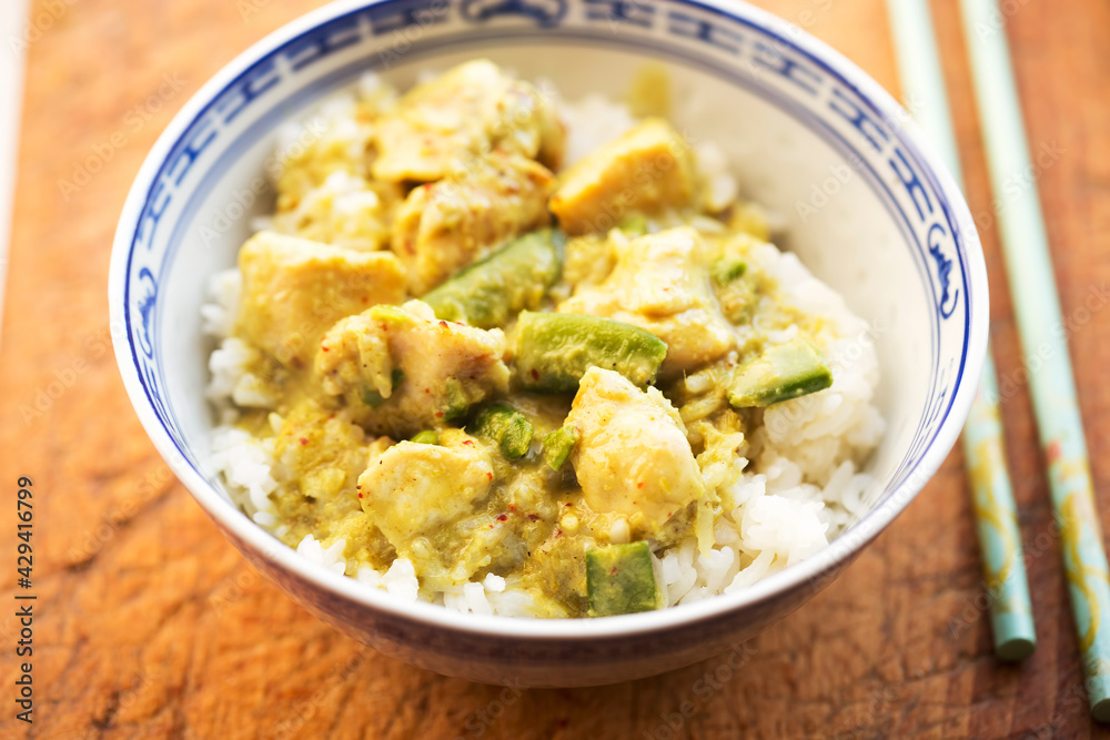 Green thai chicken curry with peas and lemon grass, rice 