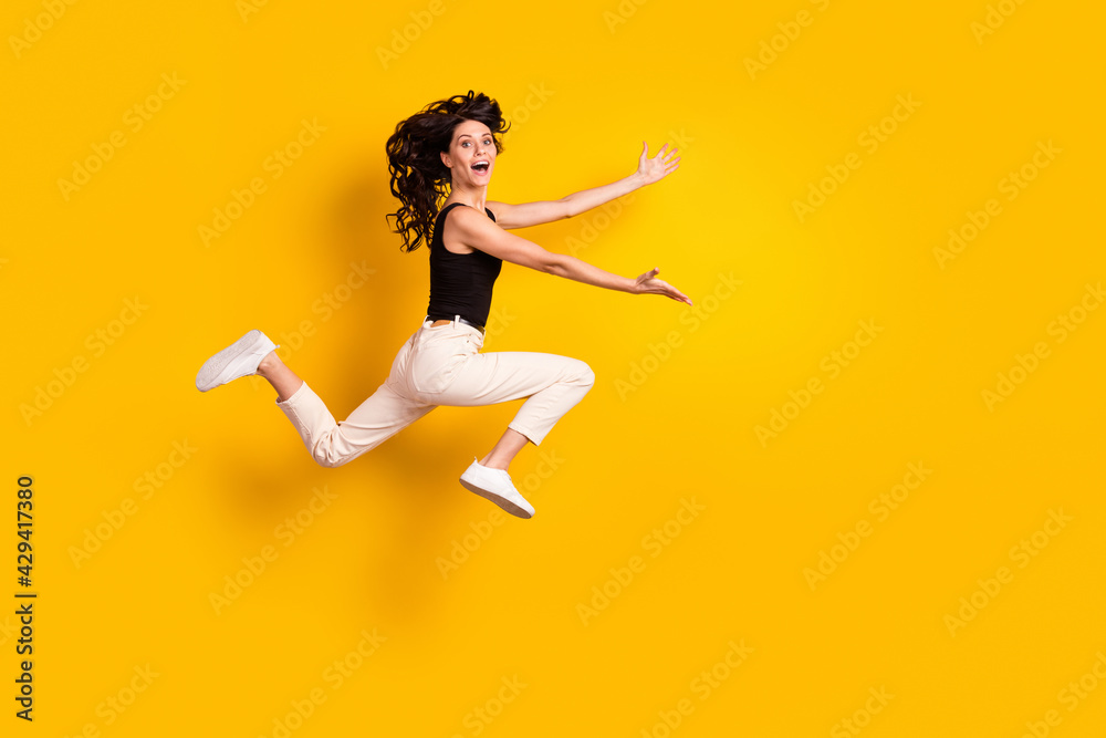 Full length body size side profile photo of woman running fast on meeting cheerful missed friends isolated bright yellow color background