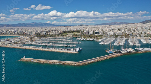 Aerial drone photo of beautiful Marina of Alimos with many luxury yachts and sail boats anchored, Athens riviera, Attica, Greece