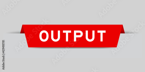 Red color inserted label with word output on gray background