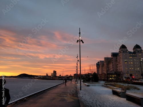 sunset by the docks in the city in the winter